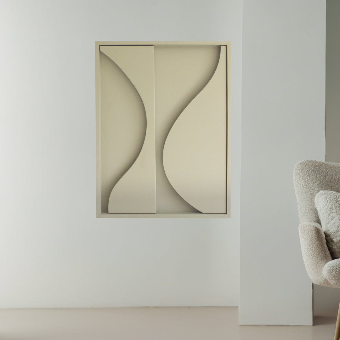 Abstract wall art with curving lines, displayed above a sage armchair in a minimalist living room setting.